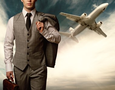 Businessman traveling concept clipart