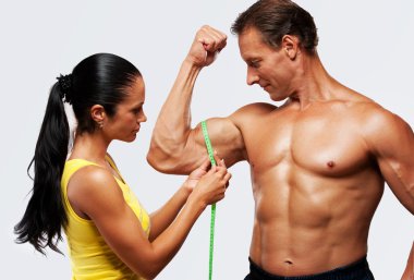 Athletic man and woman clipart