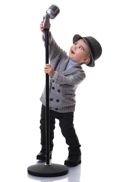 Chlapeček s mikrofonem — Stock fotografie