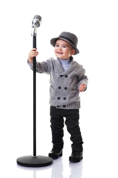 Bir mikrofon ile erkek bebek — Stok fotoğraf