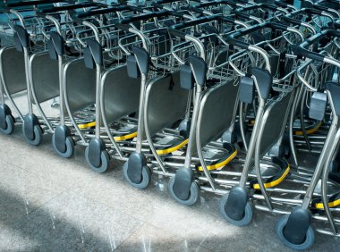 Luggage carts in airport clipart