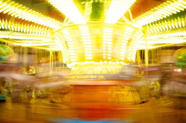 Merry-go-round in motion blur clipart