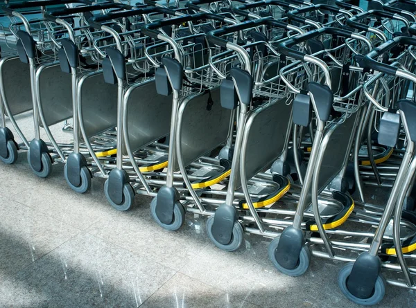Luggage carts in airport — Stock Photo, Image