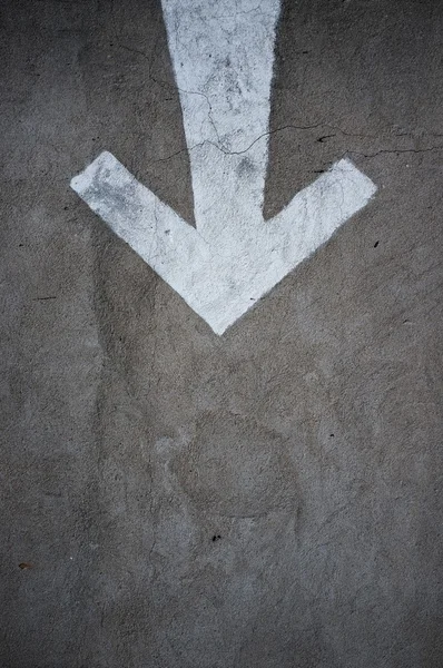 Drawn arrow on a lane. — Stock Photo, Image