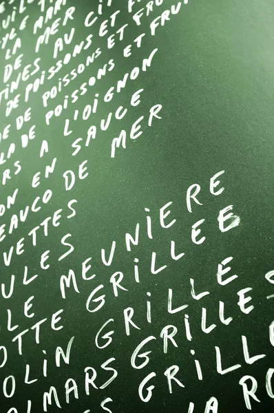 Green chalkboard with menu. — Stock Photo, Image