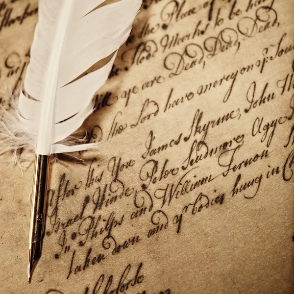 Glasses and inkwell on an old letter — Stock Photo, Image