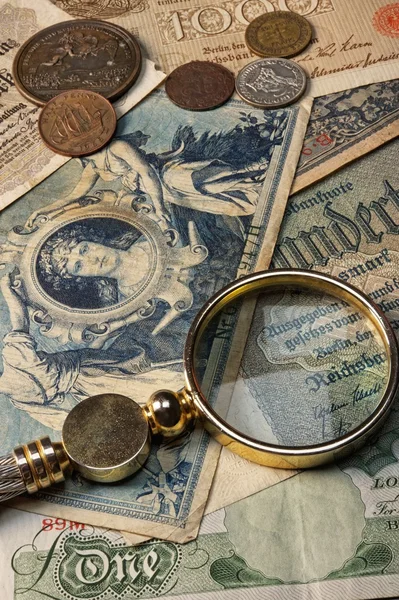Old money with a lope on it — Stock Photo, Image