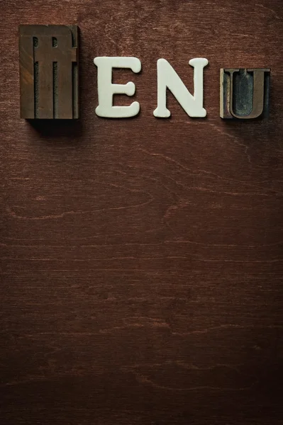 stock image The word menu written on wooden background