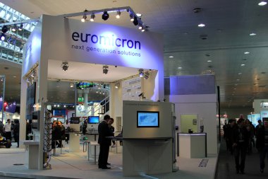 HANNOVER - MARCH 10: stand of Euromicron on March 10, 2012 at CEBIT computer expo, Hannover, Germany. CeBIT is the world's largest computer expo. clipart