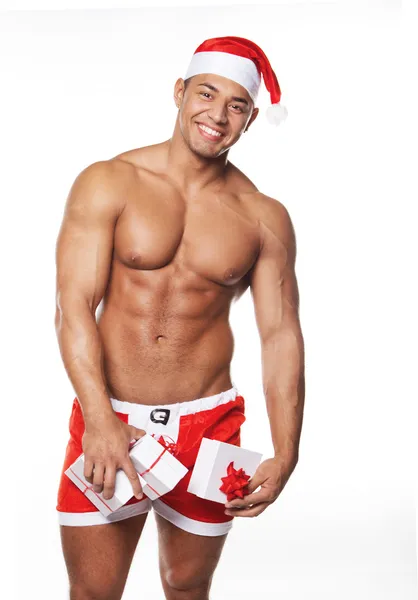 Bild eines sexy Mannes im Weihnachtsmann-Kostüm — Stockfoto
