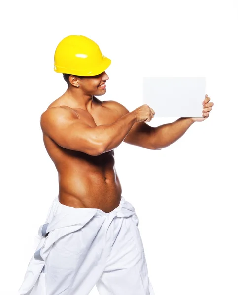 Imagen de sexy macho sosteniendo signo en blanco — Foto de Stock