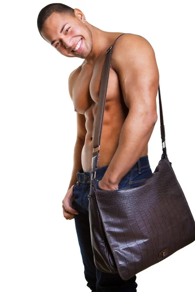 Сексуальный мужчина с сумкой — стоковое фото
