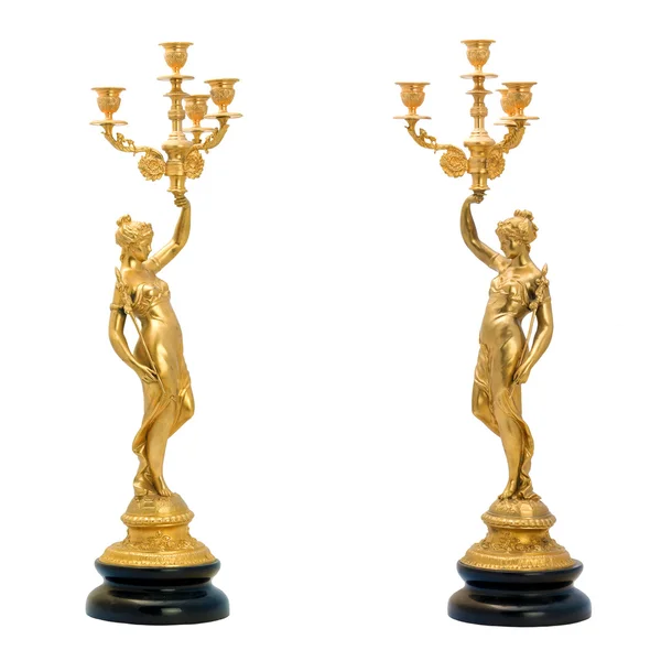 Kadın heykelcikleri şeklinde iki antik altın şamdan. — Stok fotoğraf