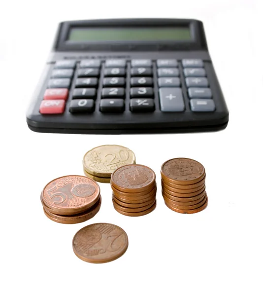 Calculadora y monedas —  Fotos de Stock