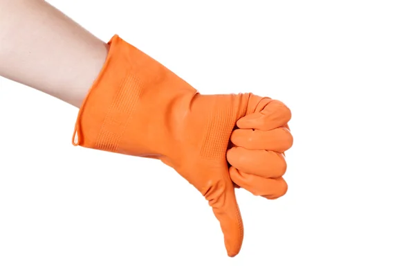 Thumb down in the orange vinyl gloves — Stock Photo, Image