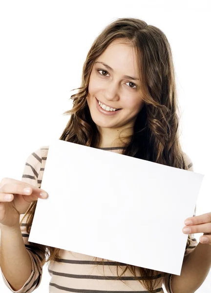 Tiener houdt een stuk og papier — Stockfoto