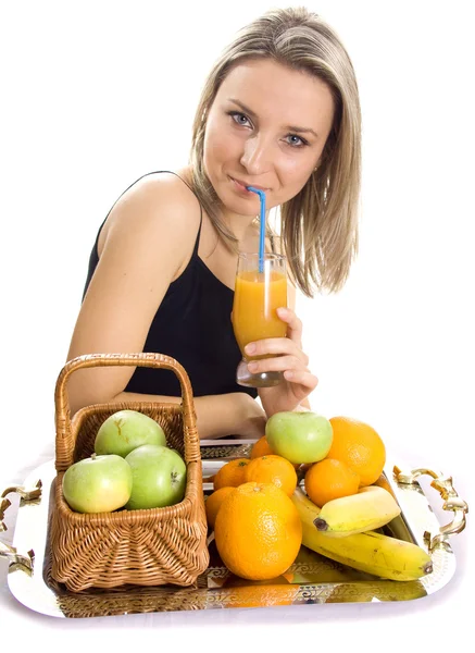 Beautiful girl drinks juice — Stock Photo, Image
