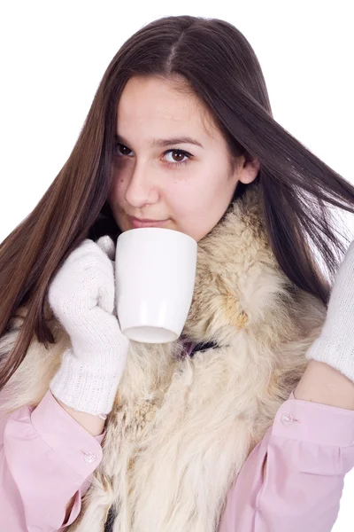 Girl with a cup of hot coffee or tea — Stock Photo, Image