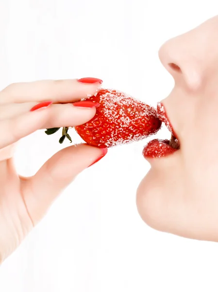 Woman's mouth with red strawberry — Stock Photo, Image