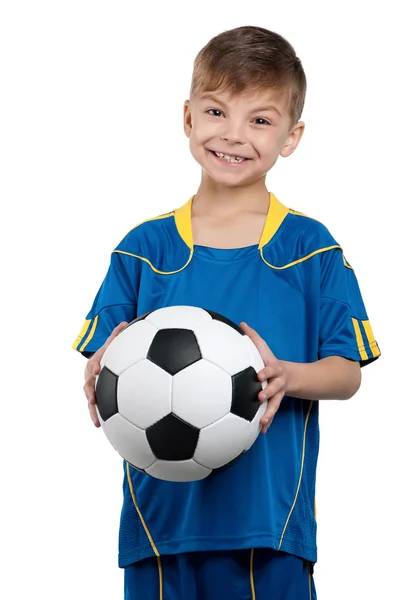 Хлопчик у національних футбольному рівномірний — стокове фото