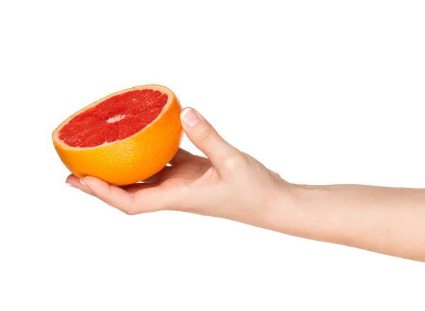 Рука с грейпфрутом — стоковое фото