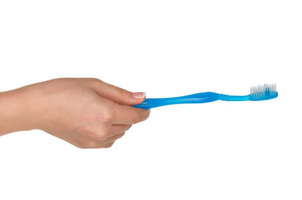 Hand with tooth brush — Stock Photo, Image