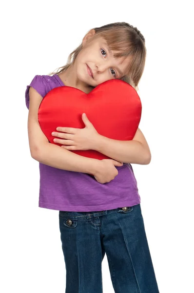 Holčička s červeným srdcem — Stock fotografie