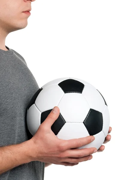 Человек с классическим футбольным мячом — стоковое фото