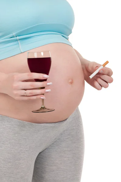 Barriga grávida com vinho e cigarros — Fotografia de Stock