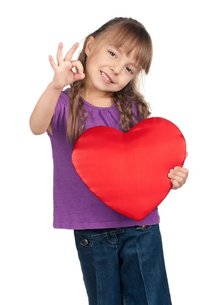 Kleines Mädchen mit rotem Herz — Stockfoto