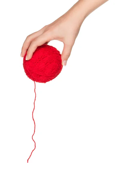 Ręka z czerwoną piłkę — Zdjęcie stockowe