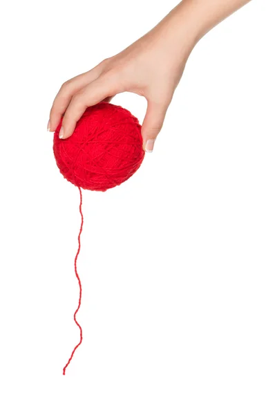 Main avec boule rouge — Photo