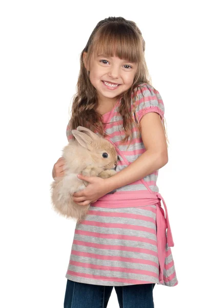Маленькая девочка с кроликом — стоковое фото