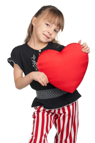 Petite fille au cœur rouge — Photo