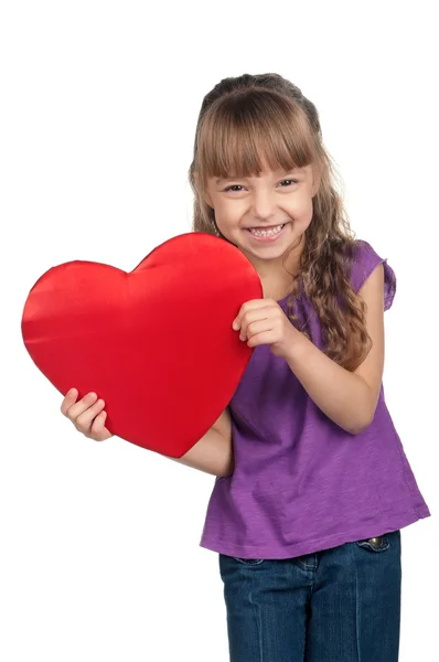 Kırmızı kalpli küçük kız — Stok fotoğraf