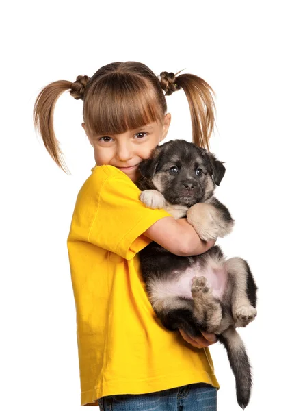 Дівчинка зі щеням — стокове фото