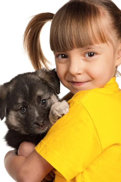 Дівчинка зі щеням — стокове фото