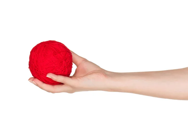 Mão com bola vermelha — Fotografia de Stock