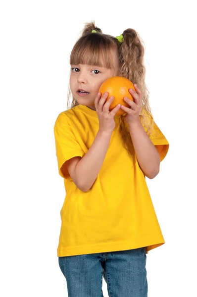 Девочка с грейпфрутом — стоковое фото