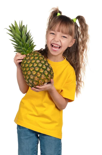 Little girl with pineapple — Stock Photo, Image