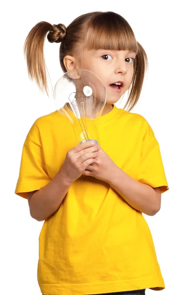 Girl with light bulb — Stock Photo, Image