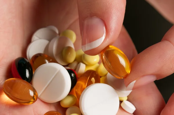 Hand with pills — Stock Photo, Image