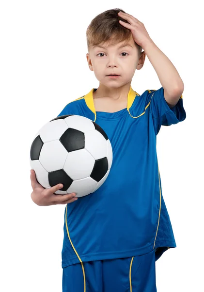 Хлопчик у національних футбольному рівномірний — стокове фото
