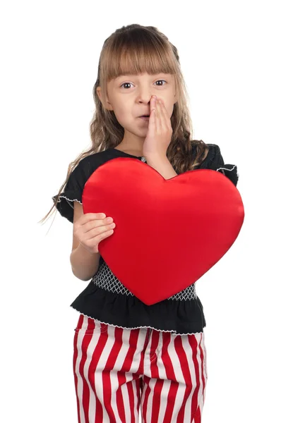 Klein meisje met rood hart — Stockfoto