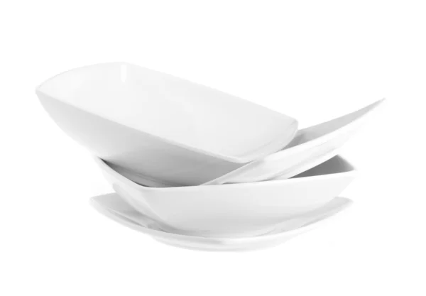 Стопка простых белых тарелок — стоковое фото