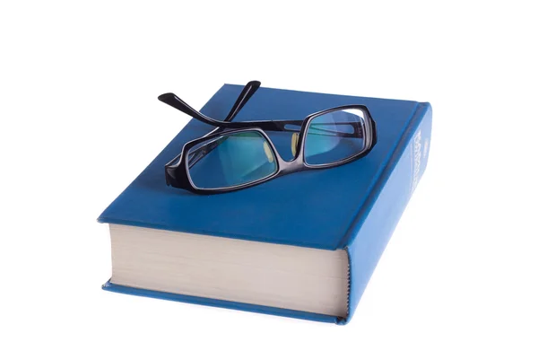 A könyv olvasó szemüveg — Stock Fotó