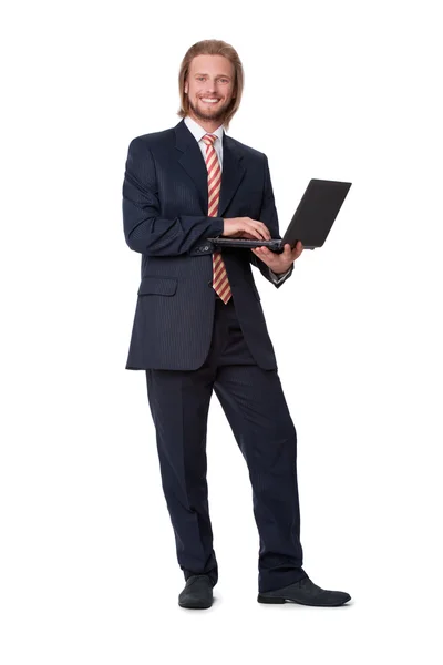 Jeune homme d'affaires avec tablette tactile numérique — Photo