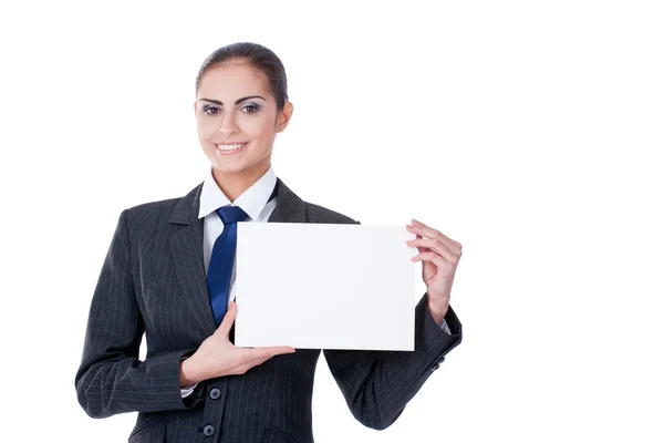Young businesswoman pointing into empty — Stock Photo, Image