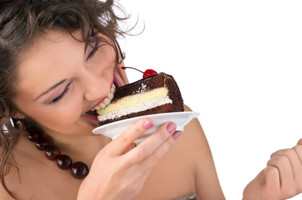 Mulher morena atraente com um bolo — Fotografia de Stock