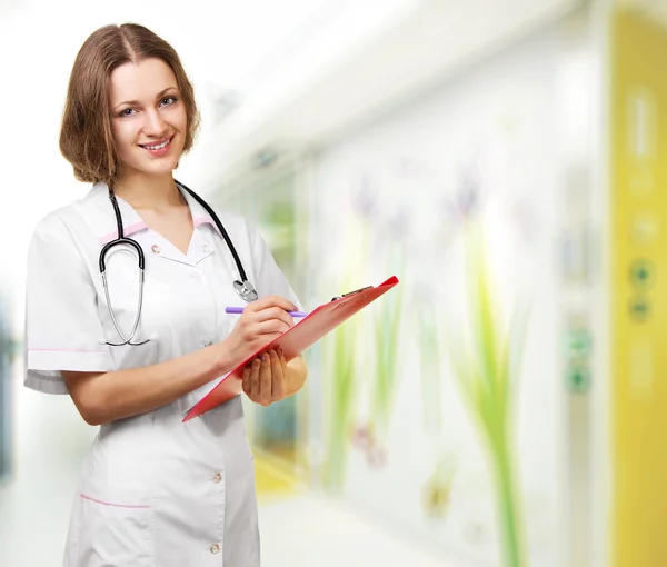 Woman Doctor Taking Notes — Stock Photo, Image